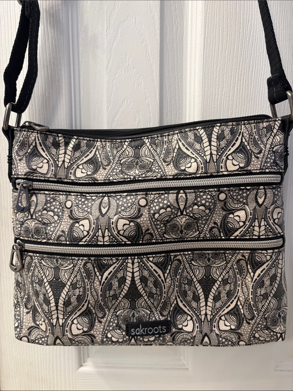 Sakroots Black & Cream Patterned Crossbody Bag with charms